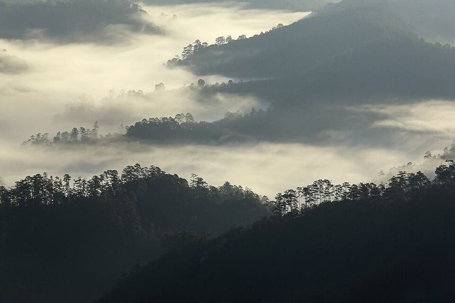 Mist over a mountain valley in Mae Hong Son province, Thailand